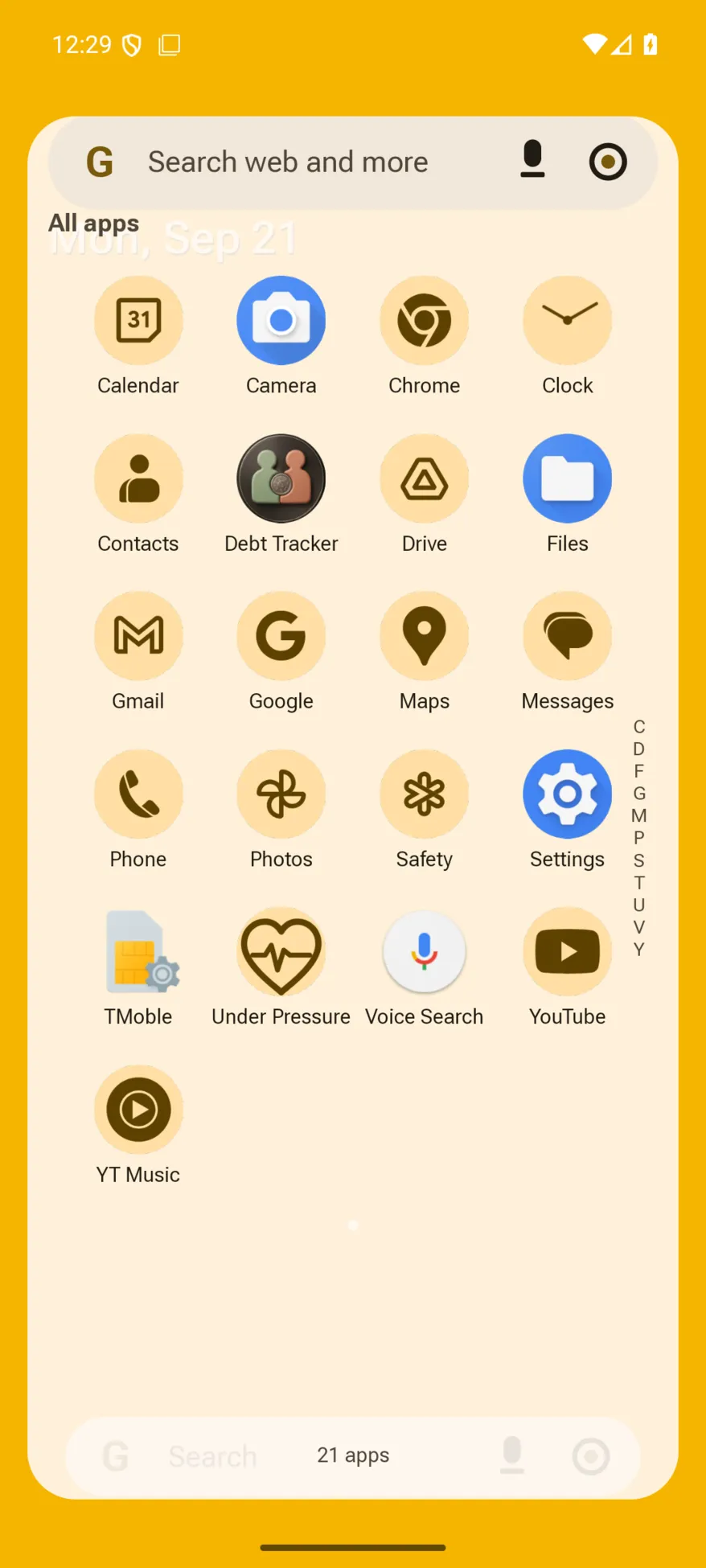 Themed icons in the app list, coloured from the system's Material You palette.